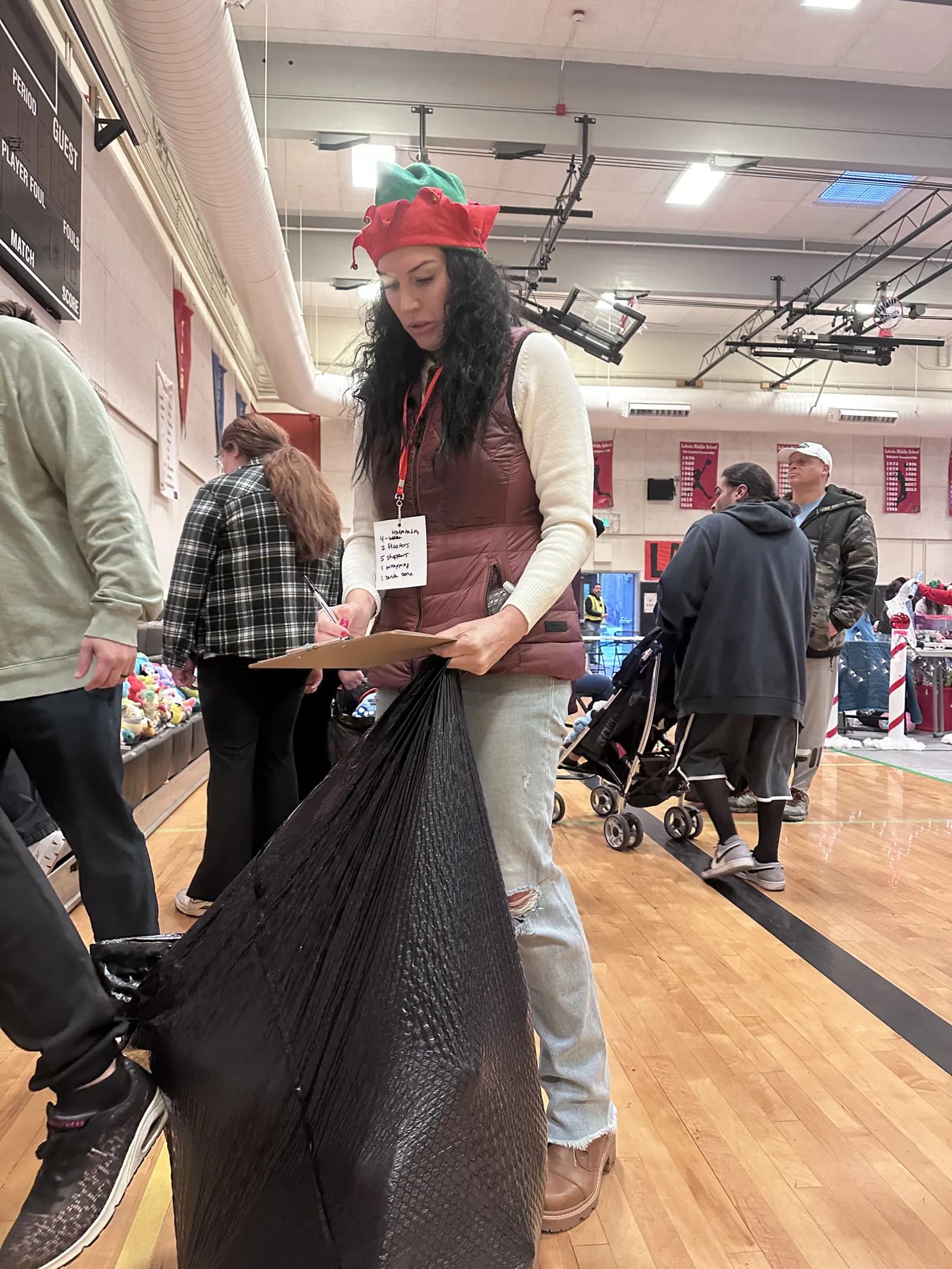 Handing out gifts at the FW Cares community event